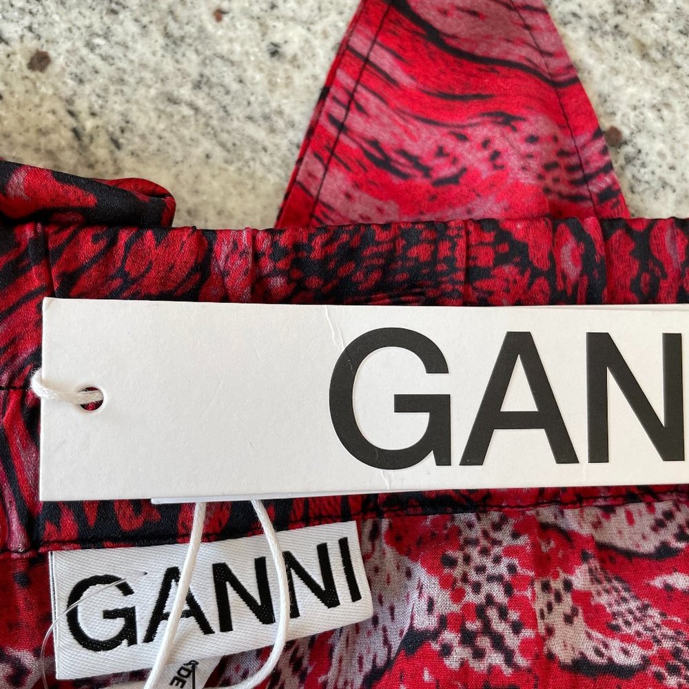 Tie-front printed stretch-silk satin midi skirt from Ganni - Picture 8 of 12